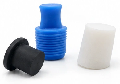 Blue threaded stopper, black T-shaped stopper and white tapered stopper